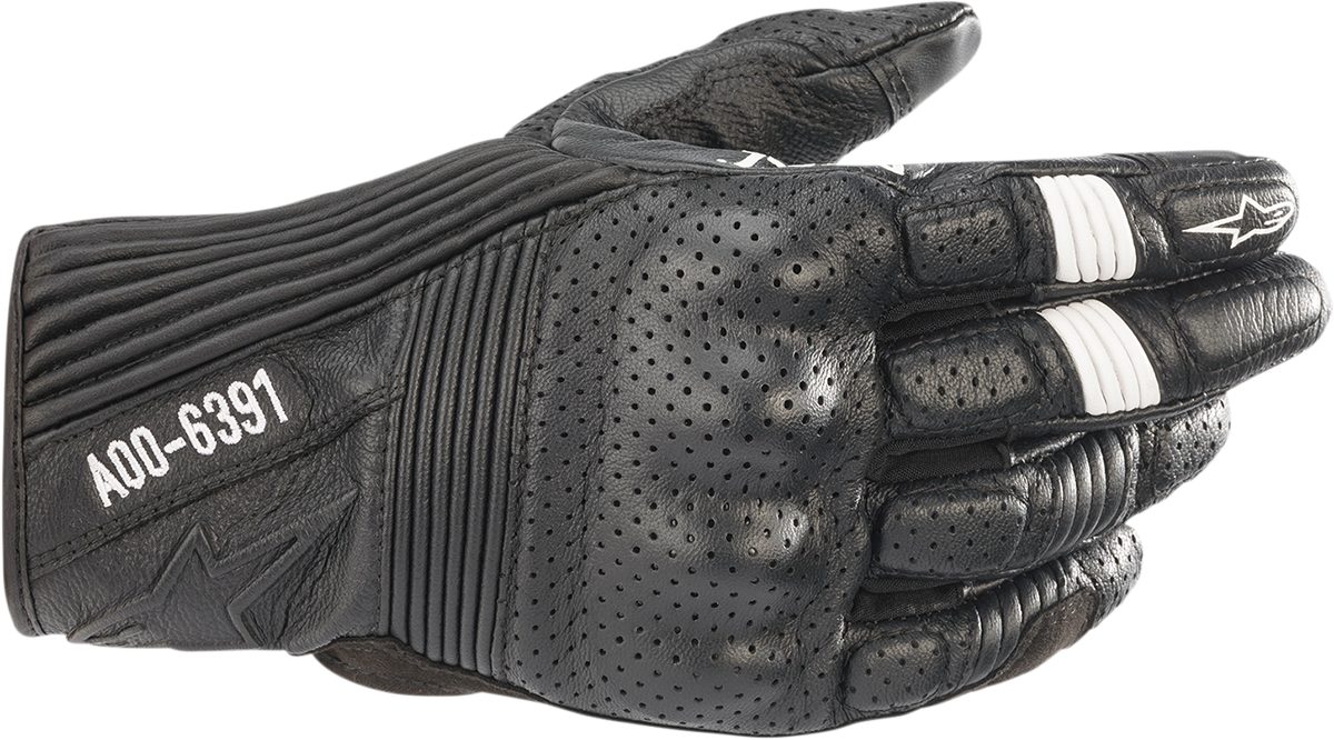 Black Alpinestars Kei Gloves in large size, showing the protective gloves with textured surface and branding details.