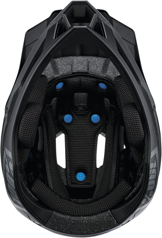 Black 100% Trajecta bicycle helmet with Fidlock buckle, size XL, featuring a sleek aerodynamic design and matte finish.