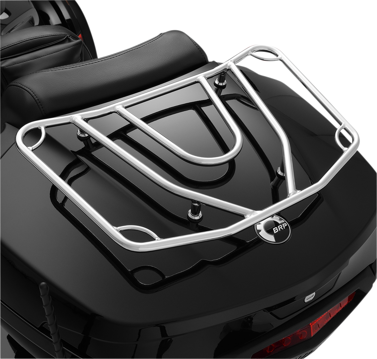 Chrome SHOW CHROME Tour Trunk Luggage Rack mounted on a motorcycle engine, designed for secure cargo transport.