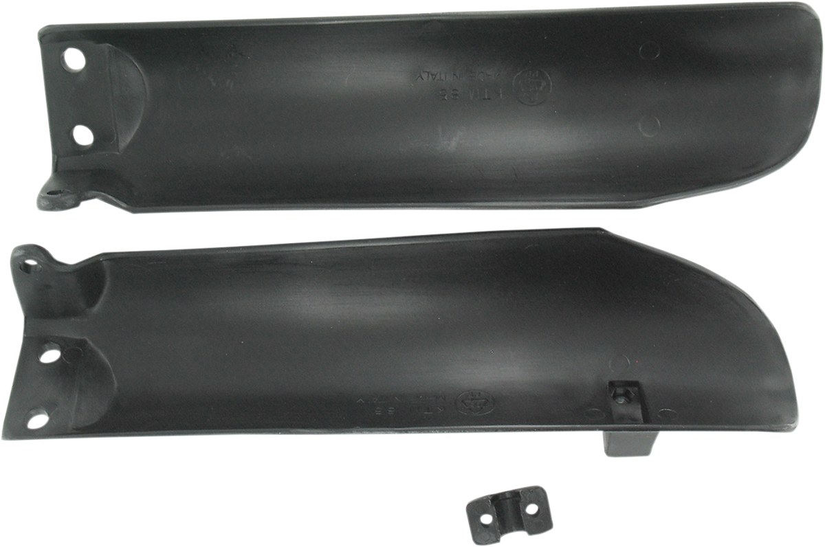 Black Acerbis lower fork covers for inverted motorcycle forks, shown on a bike's front suspension.