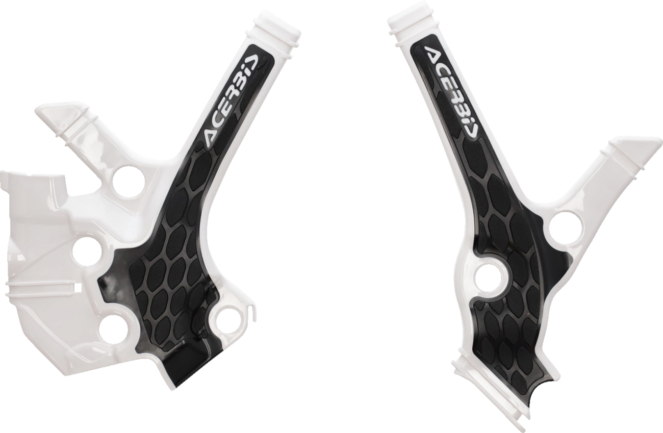 A close-up of ACERBIS X-Grip motorcycle frame guards in white and black, designed for durable body protection.