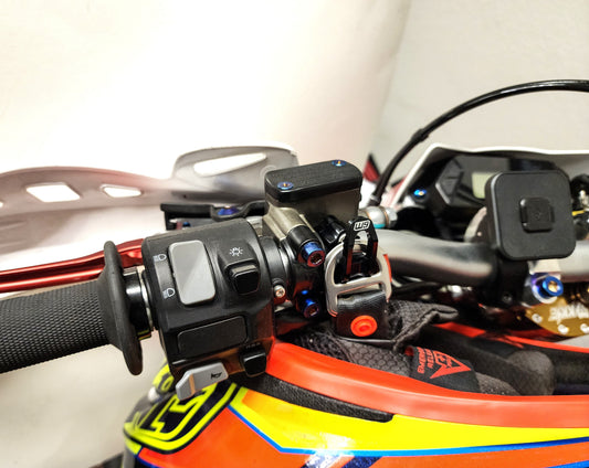 Warp9Racing helmet hook mounted on a wall, designed for easy helmet storage and organization.