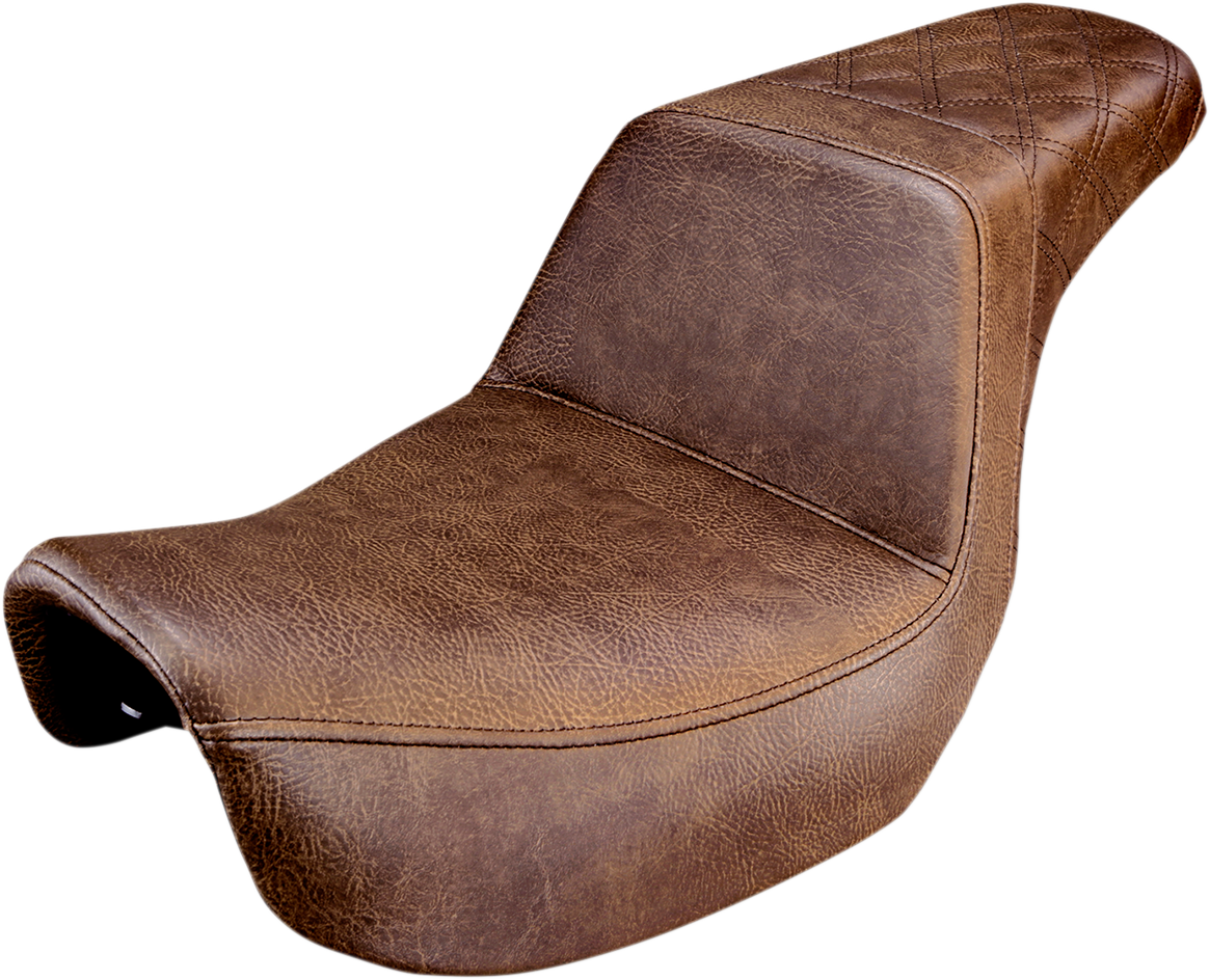 Brown SADDLEMEN Step Up Seat with rear lattice stitching for Dyna motorcycles, designed for comfort and style.