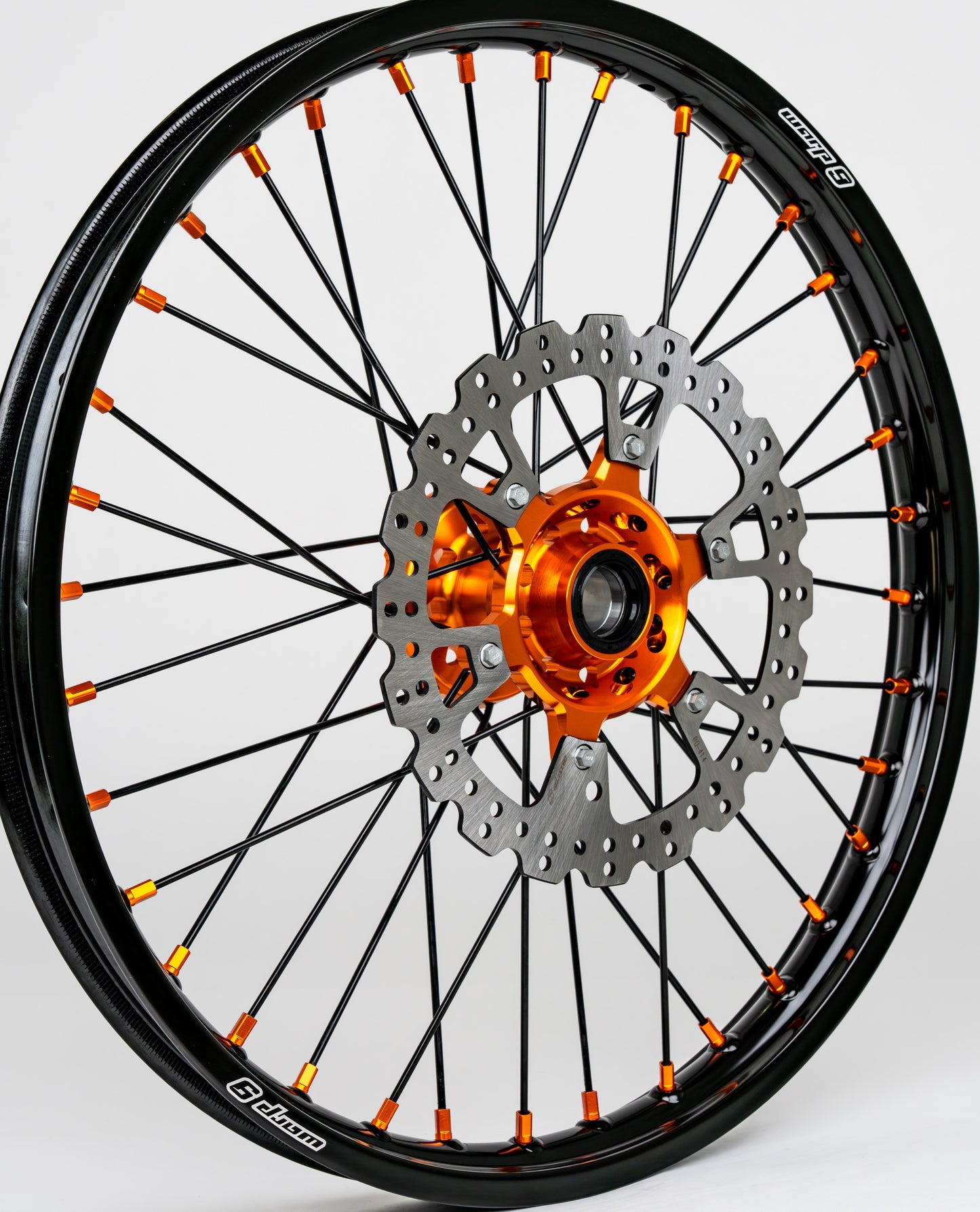 Warp9Racing KTM, Husqvarna, Gas Gas 21-inch front wheel showing spokes, rim, and hub for off-road motorcycle riding.
