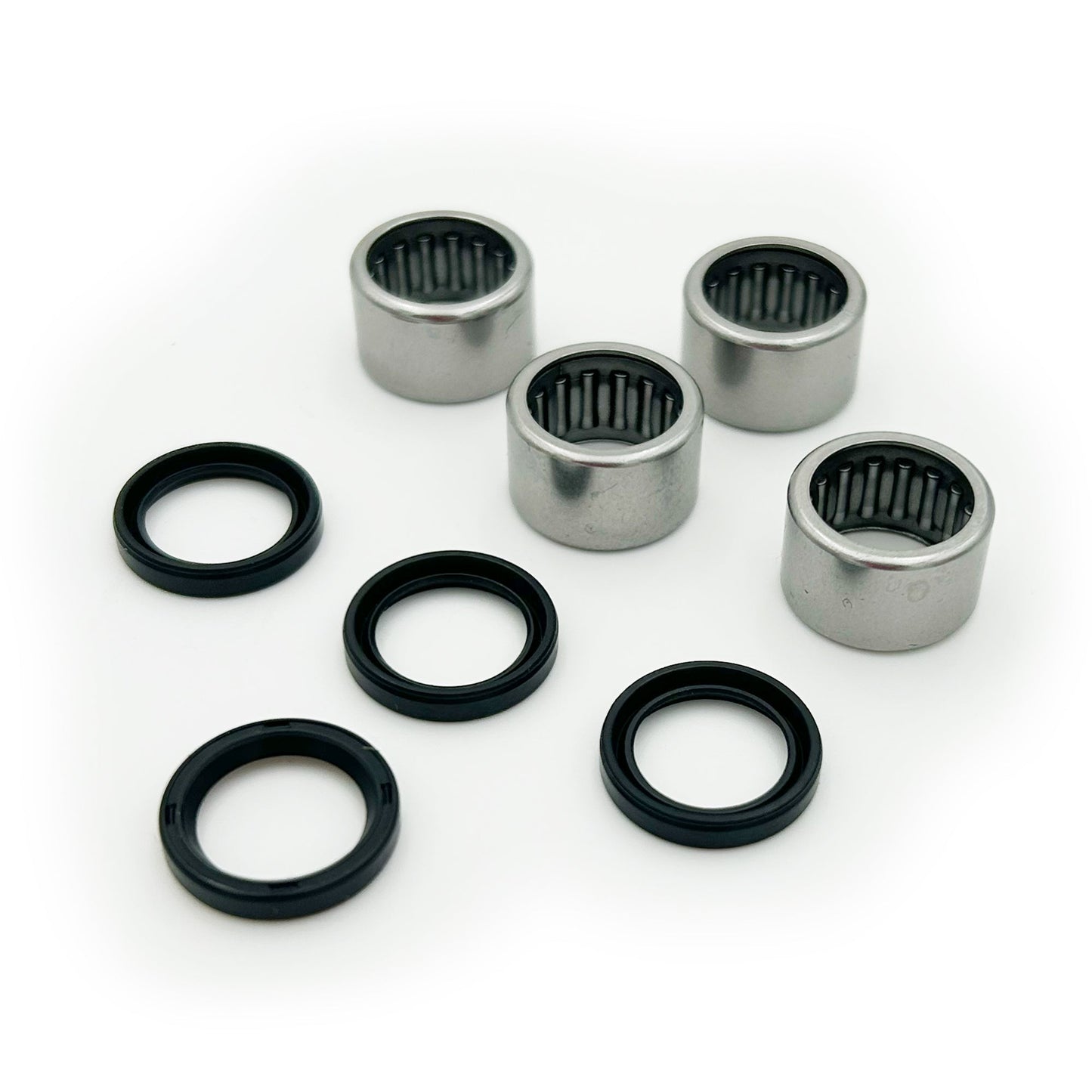E Ride Pro eDirtyBike suspension linkage bearing kit with ultra bearings, showing multiple bearings assembled for e-bike suspension.