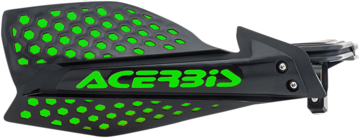 A close-up of black and green Acerbis X-Ultimate handguards mounted on motorcycle handlebars, designed to protect hands during riding.