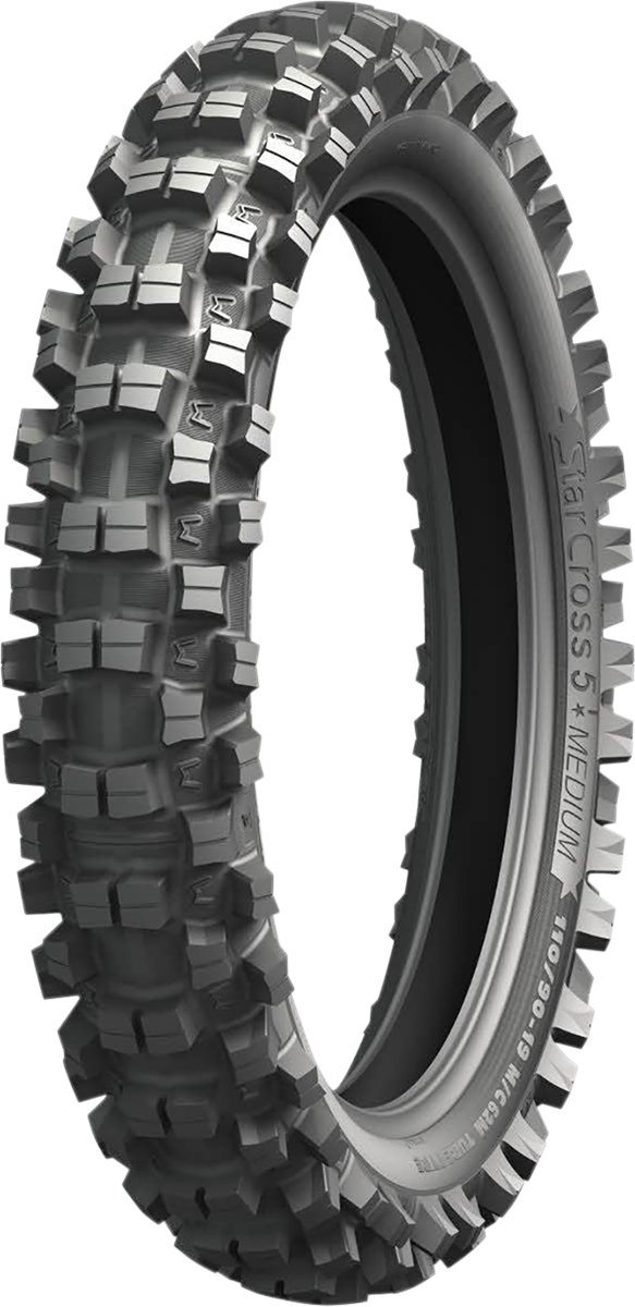 Michelin StarCross 5 Mini rear tire, 80/100-12 size, off-road motocross tire with tread pattern for dirt riding.