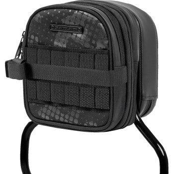 Black Saddlemens Fundamentals Sissy Bar Bag attached to a motorcycle seat, designed for secure storage and easy access.