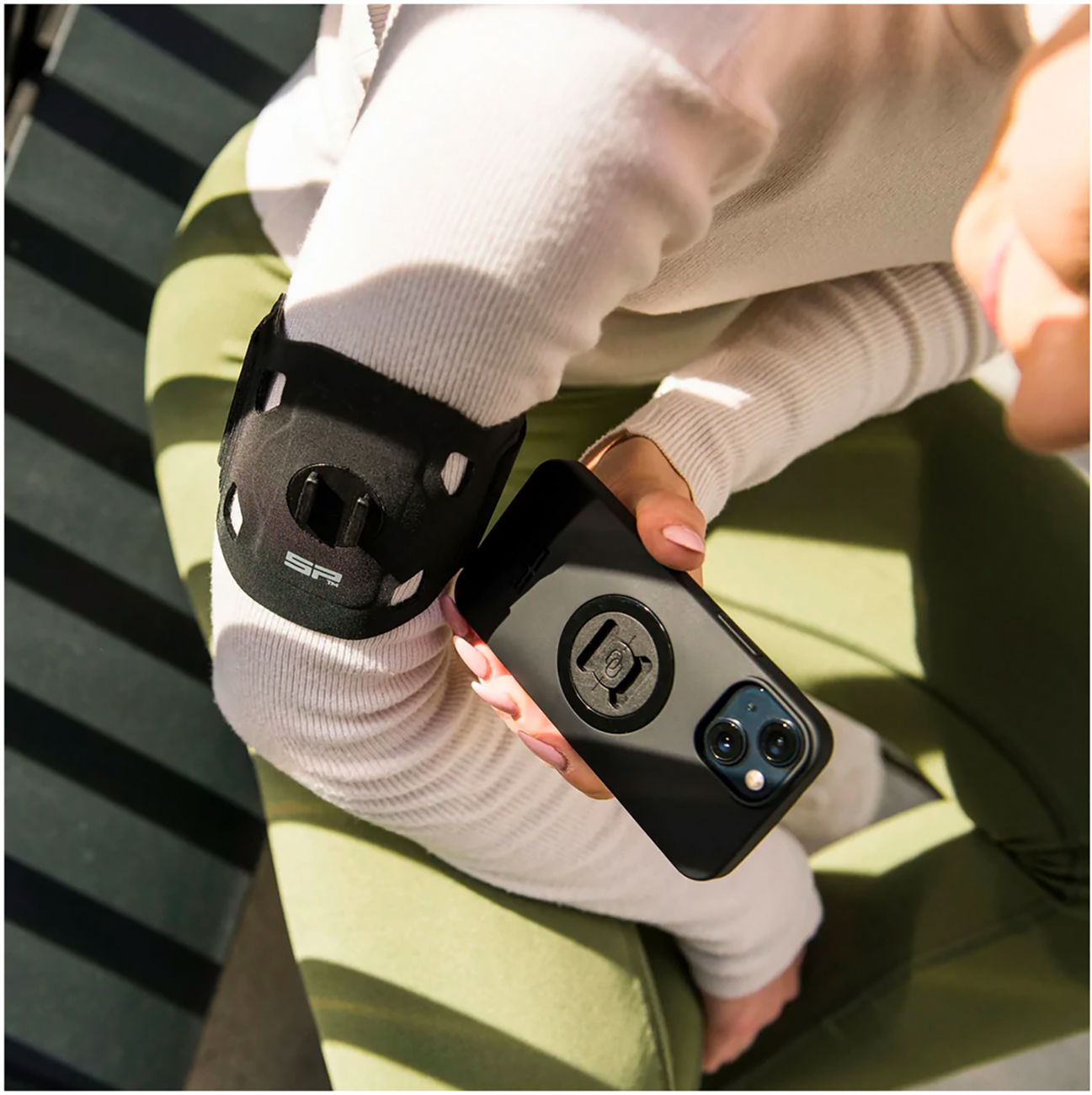 Black SP CONNECT SPC+ arm band for phone, designed for secure fit and easy access, by Bill's Exhausts.
