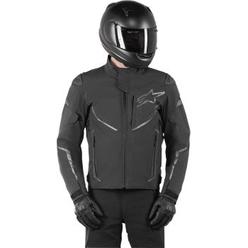 Black Alpinstars T-Fuse Sport Shell waterproof jacket in anthracite, size 2XL, with hood and front zipper.