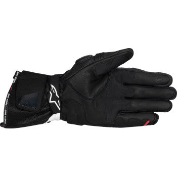 Alpinestars SP-3 motorcycle gloves in black, white, and fluo red, medium size, with protective knuckles and breathable design.