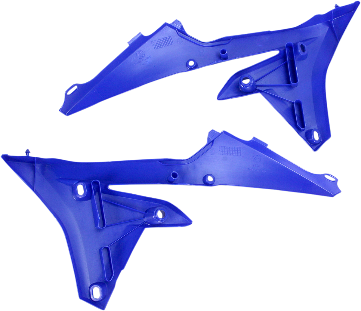 Blue Acerbis radiator shrouds for motorcycle lower body, featuring sleek design and branding details.
