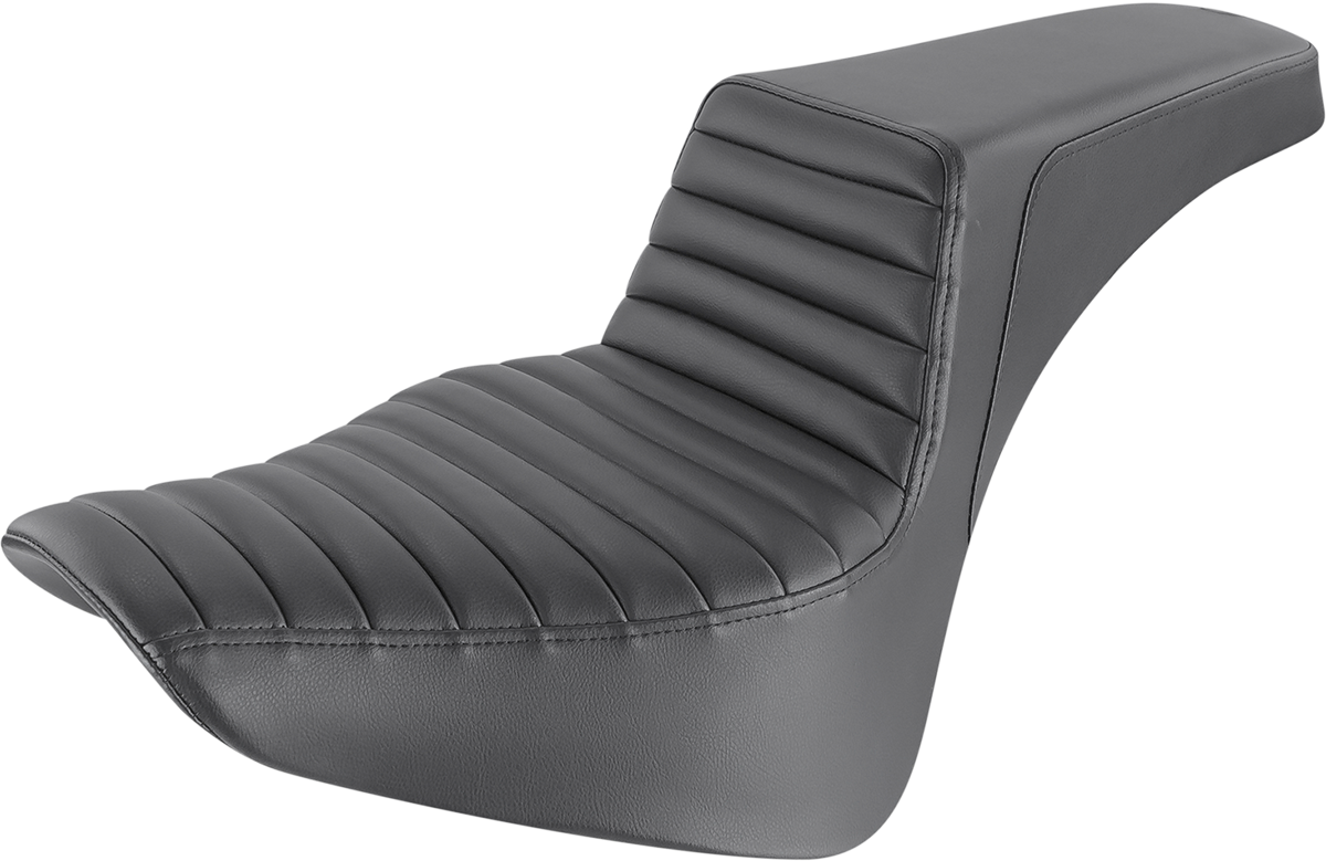 Black SADDLEMEN Step-Up Seat with front tuck-n-roll design, from Bill's Exhausts, shown from a side angle on a motorcycle seat.