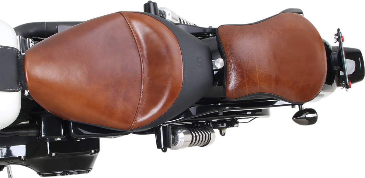 Contoured SADDLEMEN Lariat Pad seat for motorcycles, featuring a 9-inch design with padding for rider comfort.