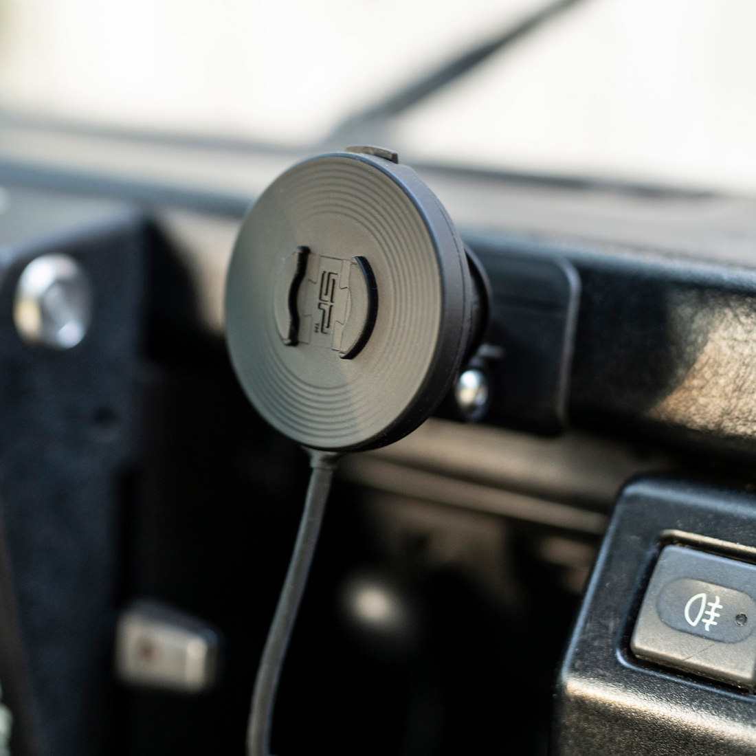 SP CONNECT anti-vibration module for phone charging, compatible with SPC+ system, supported by Bill's Exhausts, shown in the image.