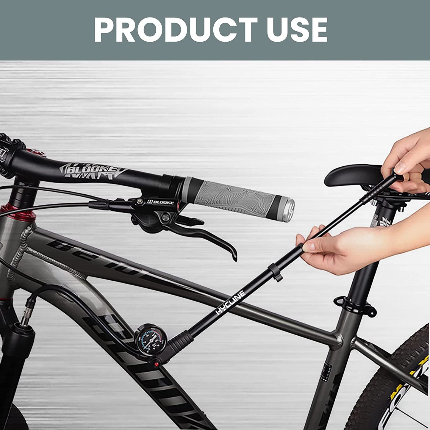 Hycline Shock Pump 300 PSI for bicycles, showing the compact handheld pump with pressure gauge and hose for shock absorber inflation.