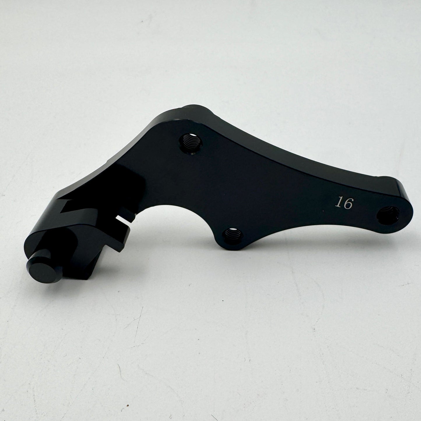 Warp9Racing Bracket 16 YZF/WRF/FANTIC motorcycle part mounted on engine or frame component.