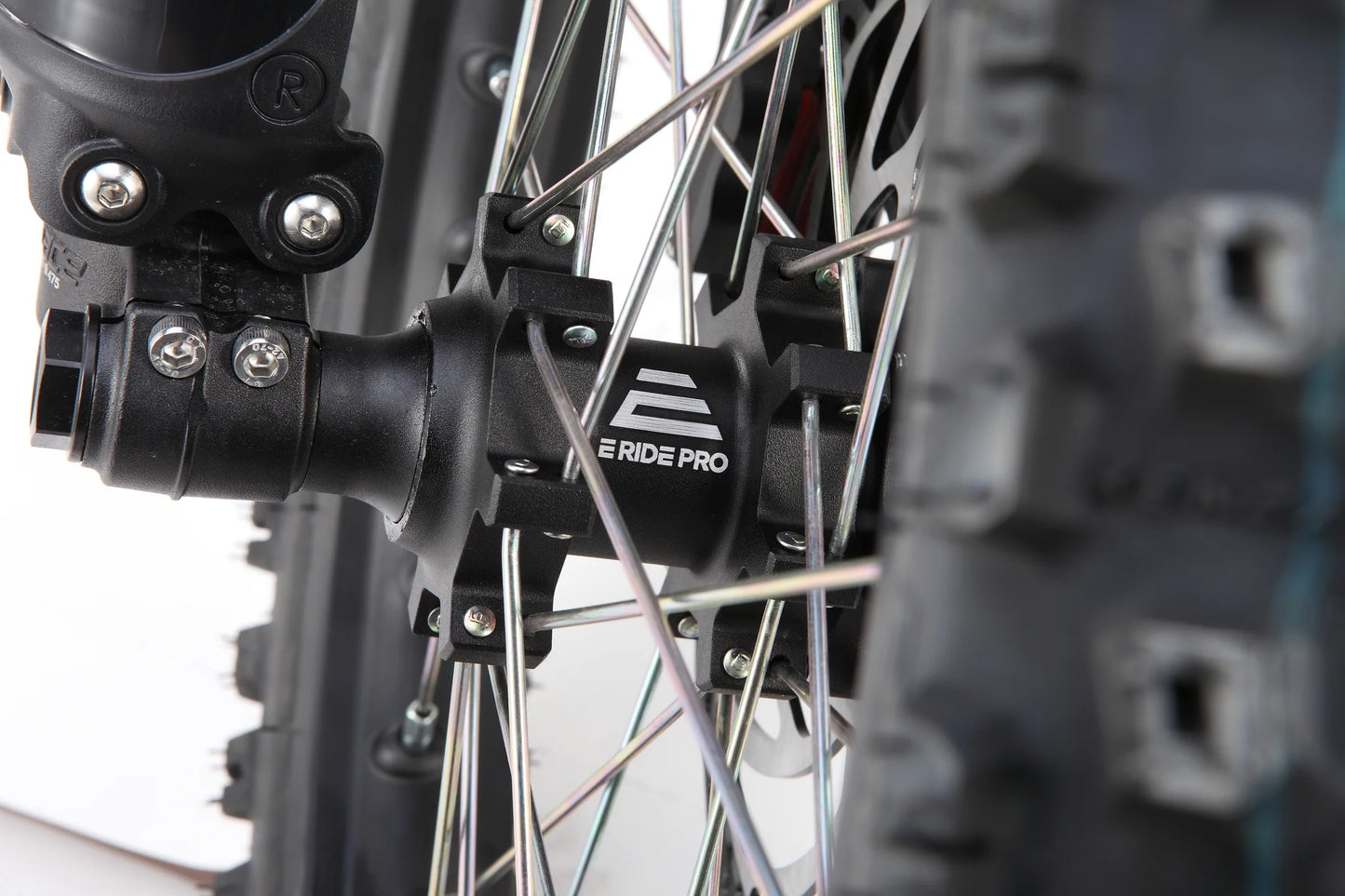 E Ride Pro Mini R electric dirt bike with 8KW peak power, 50MPH speed, black frame, and 72V battery for off-road riding.