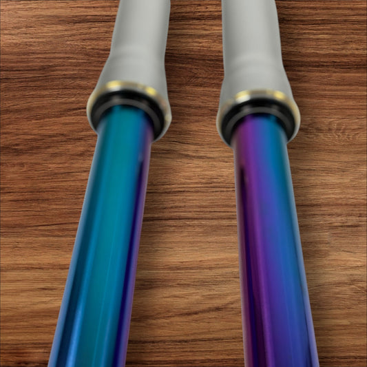 Electro & Co ETM RTR "Oil Slick" forks with fully adjustable suspension and multi-color finish for mountain bikes.