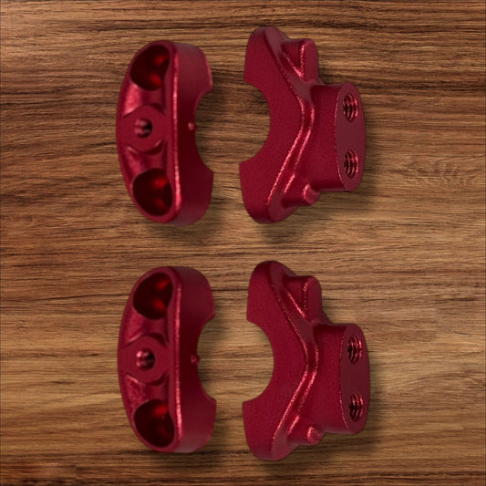 Electro & Co ETM RTR anodized handle bar clamps set in black, red, blue, green, and purple for secure mounting.