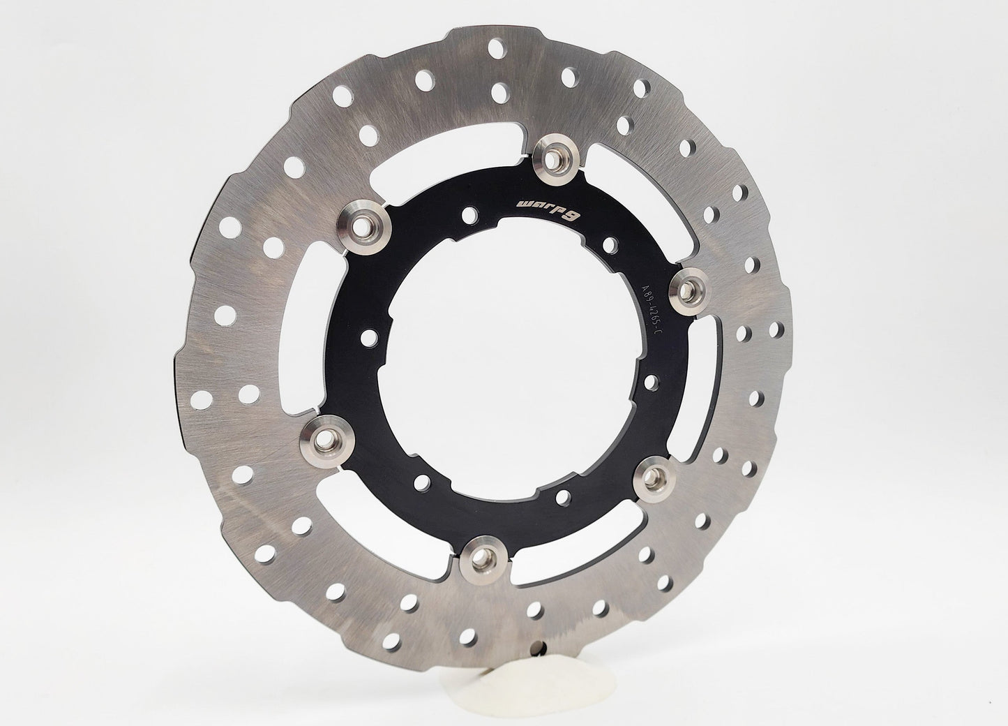 KTM 1090-1290 rear floating brake rotor by Warp9Racing, 265mm diameter, metallic finish with vented design for motorcycle braking system.
