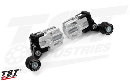 TST Industries CNC aluminum spooled captive chain adjusters for Kawasaki Z125 PRO 2017-2026, shown on a motorcycle.