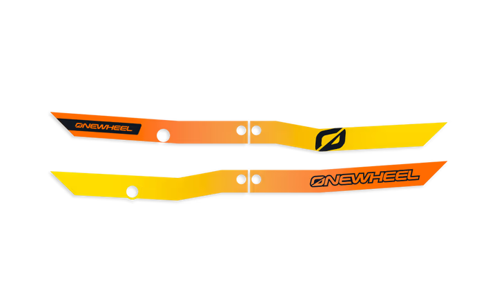 Onewheel XR Classic Recurve Rail Guards with SunsetFade design protecting the rail edges of the electric skateboard.