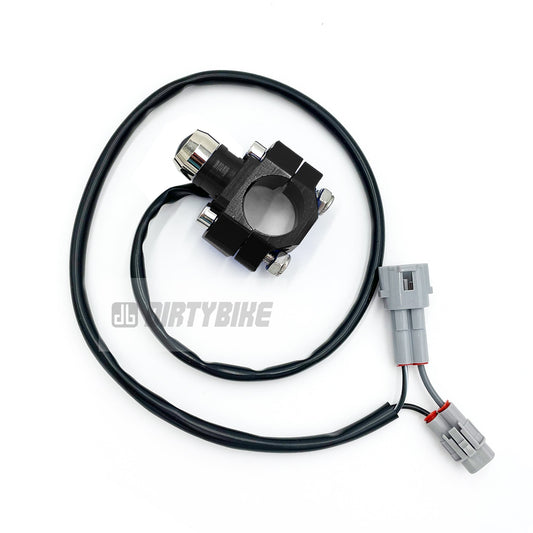 Black headlight switch for Surron LBX and Talaria Sting MX3 eDirtyBike electric bikes, shown in a close-up image.