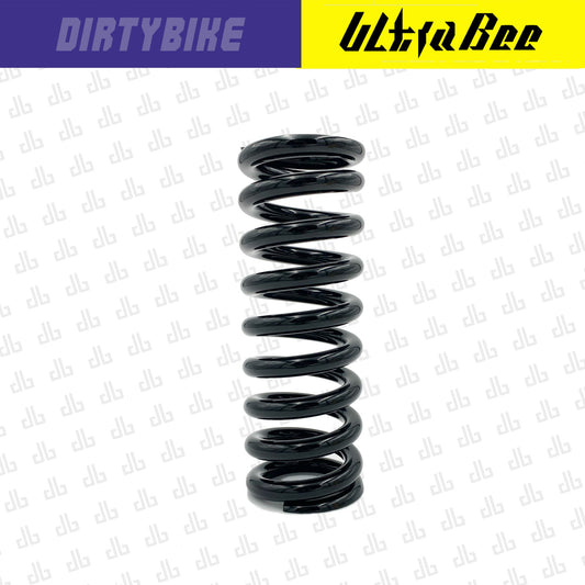 Black rear shock spring for Surron Ultra Bee electric bike by eDirtyBike, designed for enhanced suspension performance.