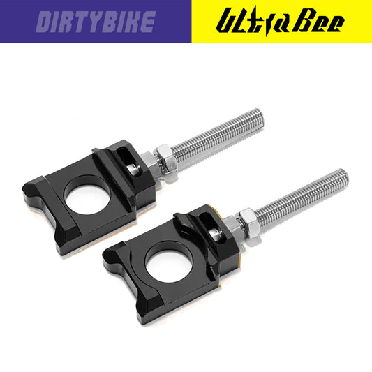 Black aluminum axle blocks for Surron Ultra Bee electric bike, designed by eDirtyBike for secure wheel attachment.
