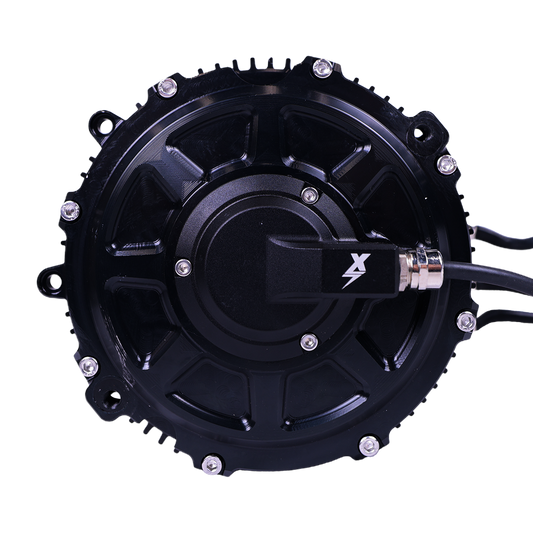 Charged Powersports EBMX XTA-60 Talaria motor showing front view with black and silver components and branding details.