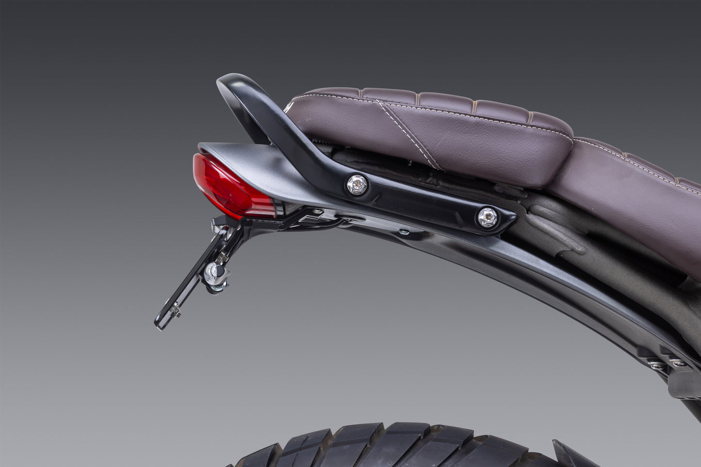 YOSHIMURA V2 Fender Eliminator Kit for motorcycle tail light assembly, featuring sleek design and installation components.