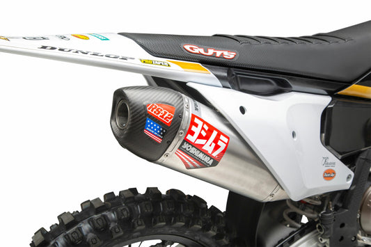 YOSHIMURA RS-12 Series exhaust system with aluminum and carbon fiber components installed on a Husqvarna or KTM motorcycle