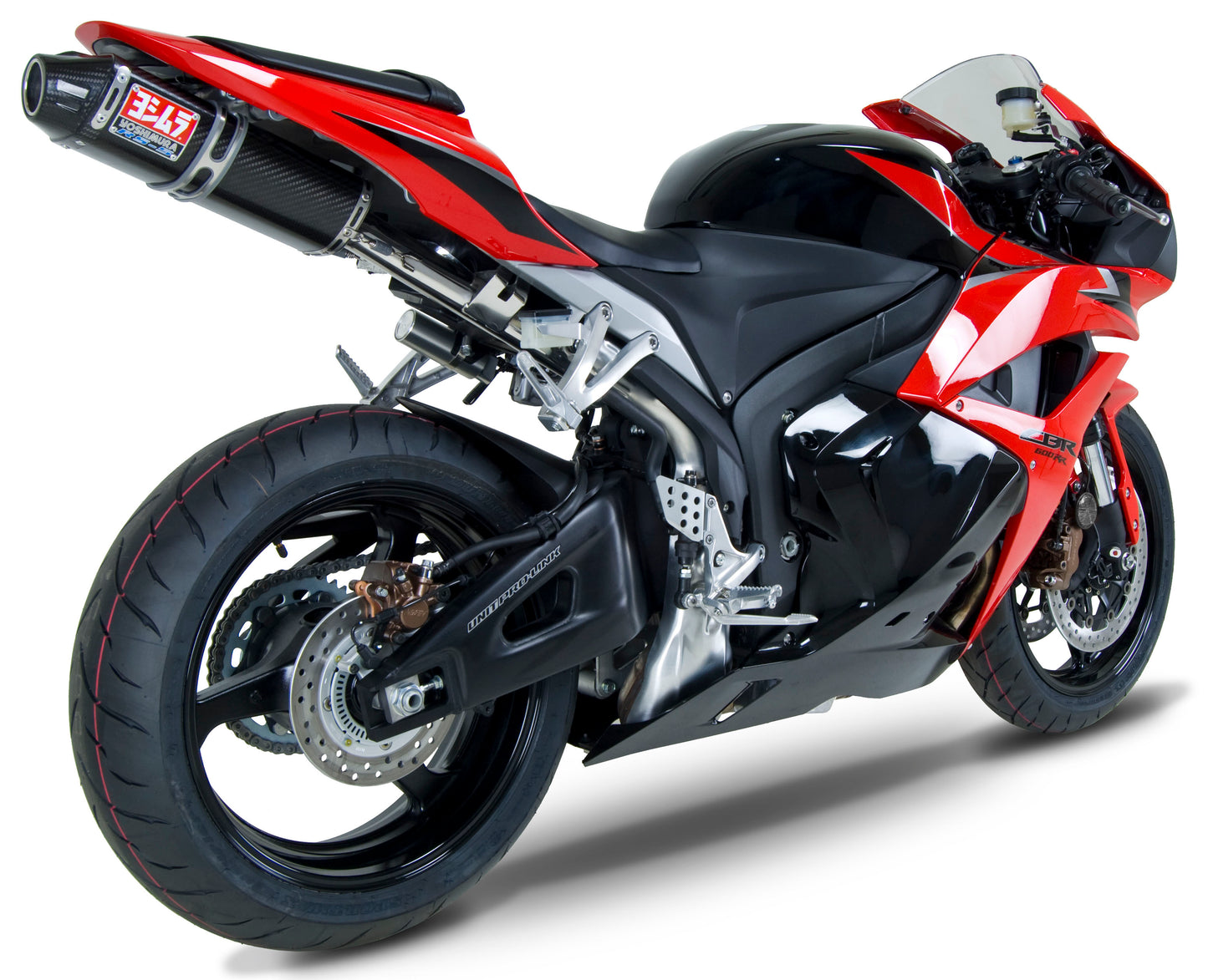 YOSHIMURA RS-5 Slip-On SS CF exhaust for UTVs, showing the stainless steel and carbon fiber finish on the motorcycle exhaust system.