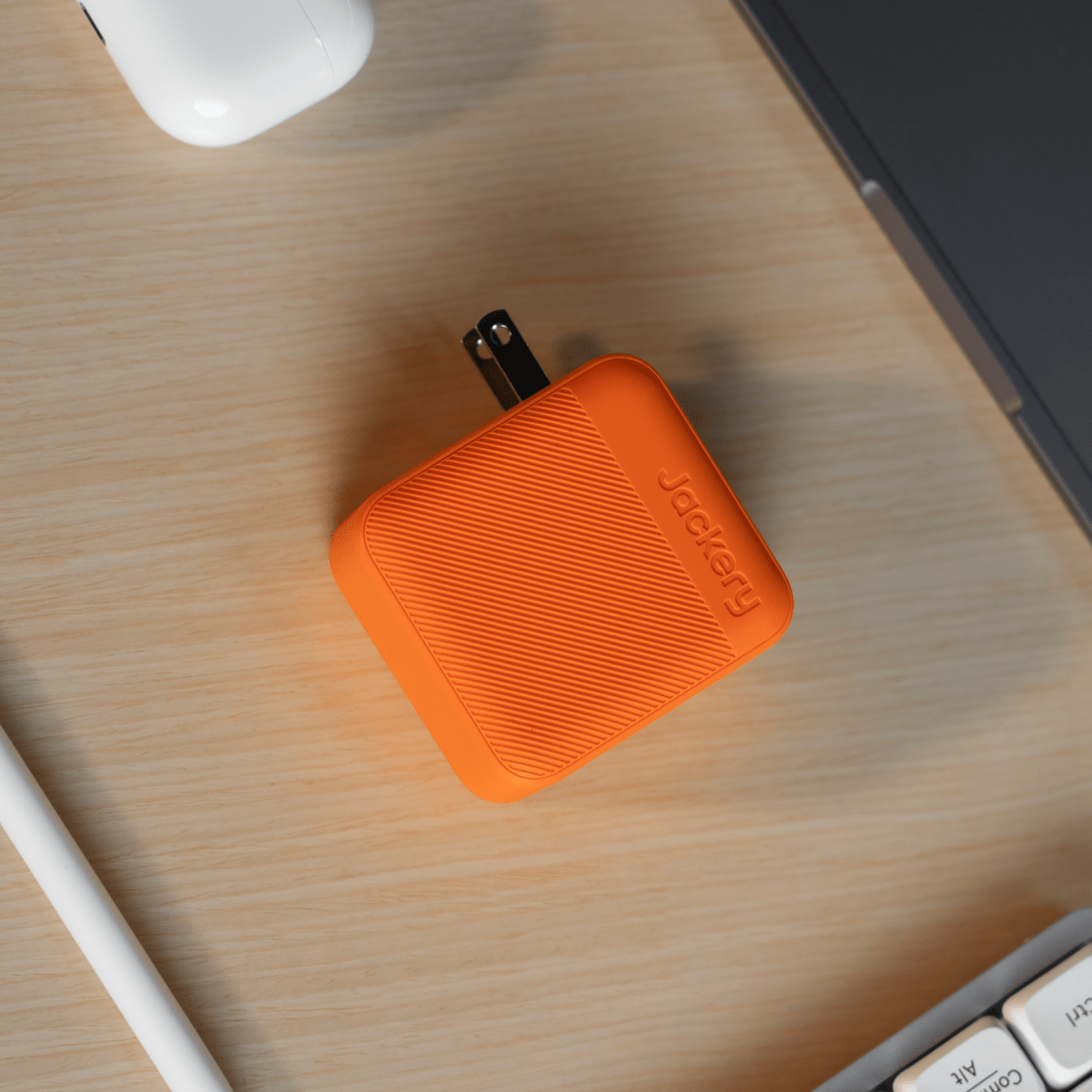 Jackery 102W GaN 3-port fast charger handbag accessory with compact black design