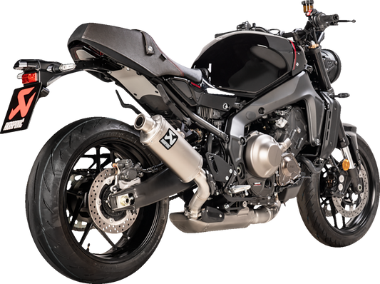 AKRAPOVIC Racing Line titanium exhaust system for Yamaha XSR 900, showing the sleek titanium finish and exhaust pipes.