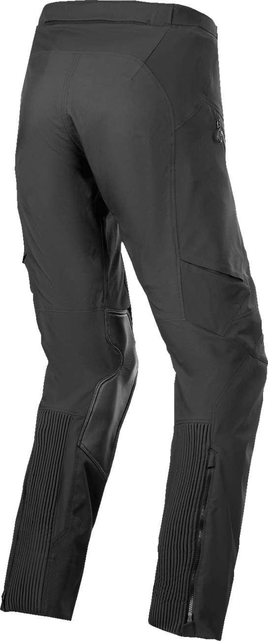 Alpinestars AMT-8 Stretch Drystar XF Pants in black, 3XL size, showing front view with reinforced knee areas and stretch fabric.
