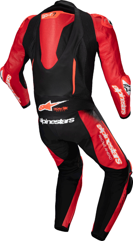 Alpinestars GP-R7 one-piece leather racing suit in black and mid-red, US 52 / EU 62, shown on a mannequin for track riding.
