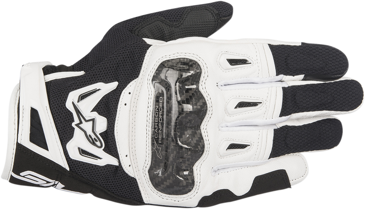 Alpinestars SMX-2 Air Carbon V2 gloves in black and white, medium size, featuring protective carbon knuckles and breathable design.