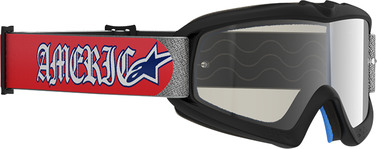 Alpinestars Youth Vision Corp goggles with silver mirror lens, red and blue frame, designed for protective motocross riding.