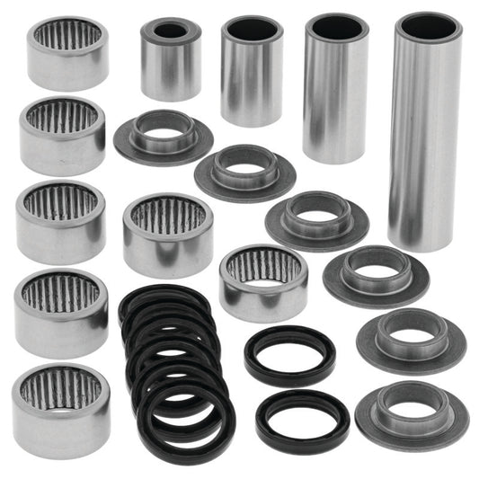 QuadBoss Arctic Cat 400 DVX linkage repair kit for Kawasaki and Suzuki models, featuring metal components and repair parts.