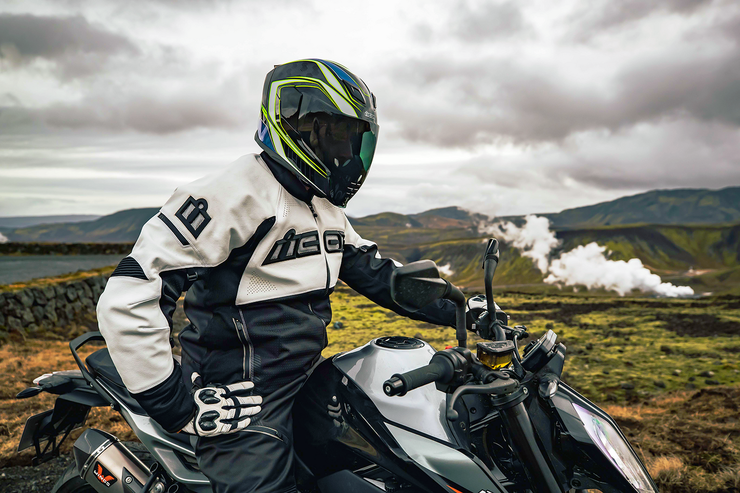 Dark smoke FliteShield for ICON Airflite™ helmet, helmet parts by Bill's Exhausts, shown in a close-up image.
