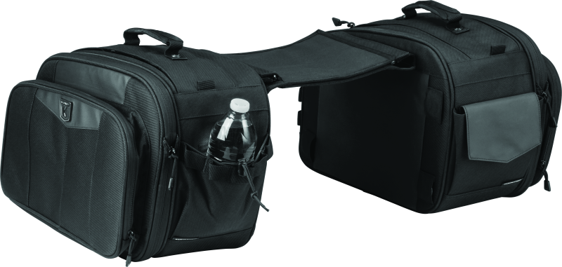 Kuryakyn Momentum Outrider Saddlebags on a motorcycle, showing waterproof leather storage with adjustable straps.