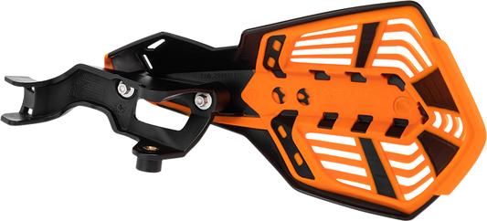 Acerbis K-Future handguards in black and orange attached to a motorcycle handlebar for protection.