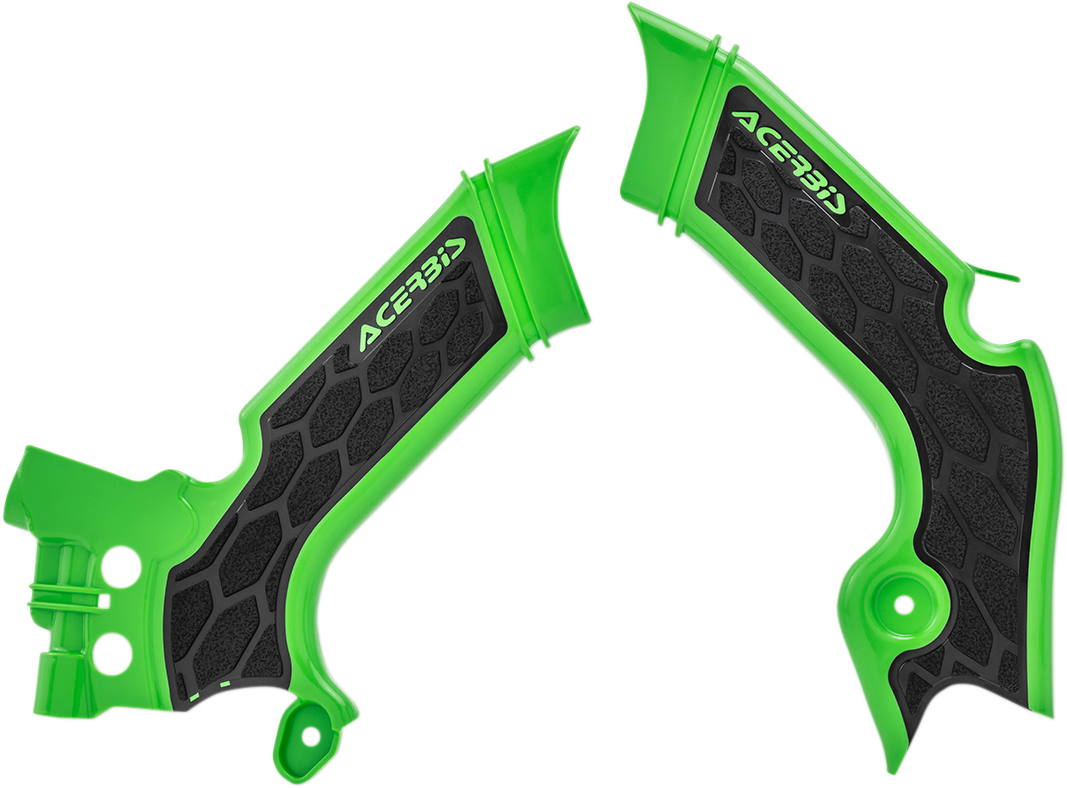 Acerbis X-Grip frame guards in green and black mounted on a motorcycle body, designed to protect the frame and enhance style.