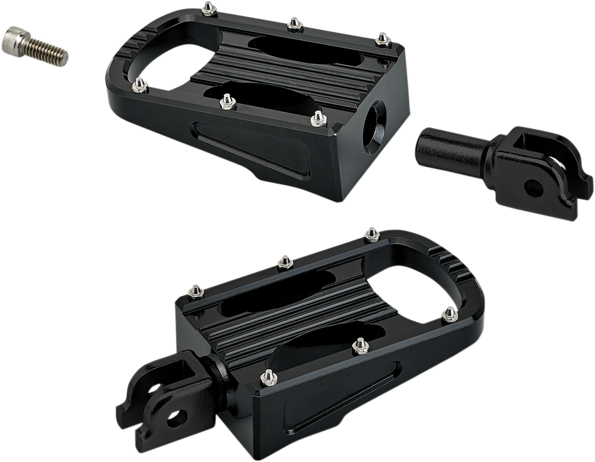 Black BILTWELL Punisher footpeg for Softail motorcycle, made by Bill's Exhausts, shown mounted on bike body.