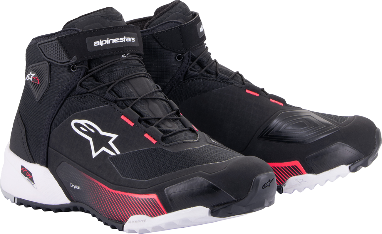 Alpinestars Stella CR-X Drystar shoes in black, white, and pink with sturdy design and breathable material for motorcycle riding.