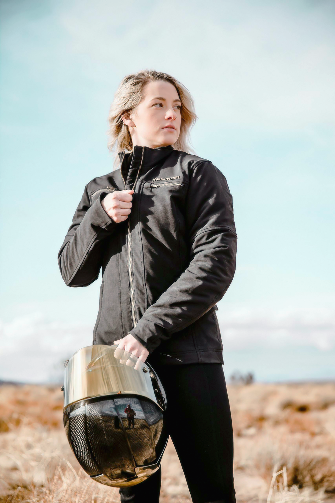 Black ICON Women's Hella2™ jacket featuring a sleek design and small size, displayed on a hanger.