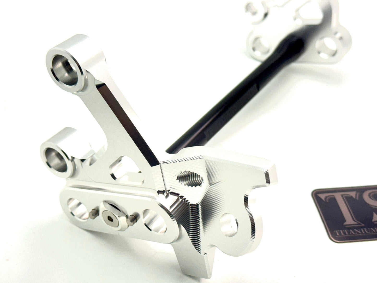 Custom CNC Aluminum Footpeg Bracket Assembly Surron - Howling Moto