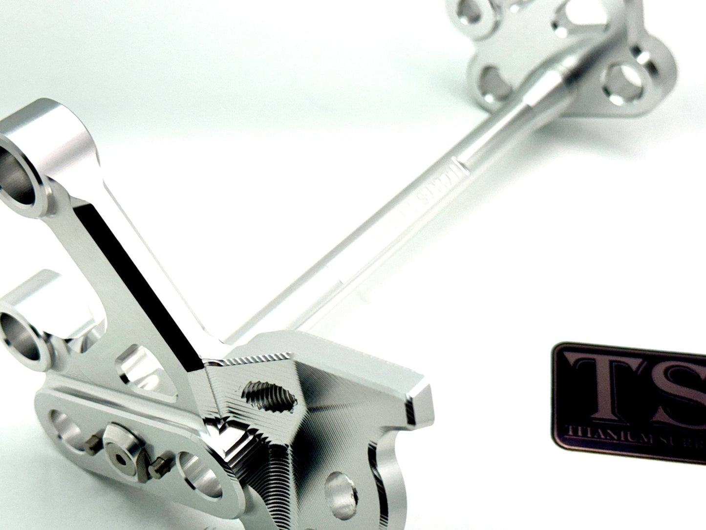 Custom CNC Aluminum Footpeg Bracket Assembly Surron - Howling Moto